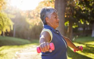 elderly woman exercising exercises to prevent osteoporosis propel physiotherapy etobicoke and pickering