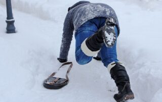 women slipping and falling down in snow foosh injury rehabilitation Propel Physiotherapy