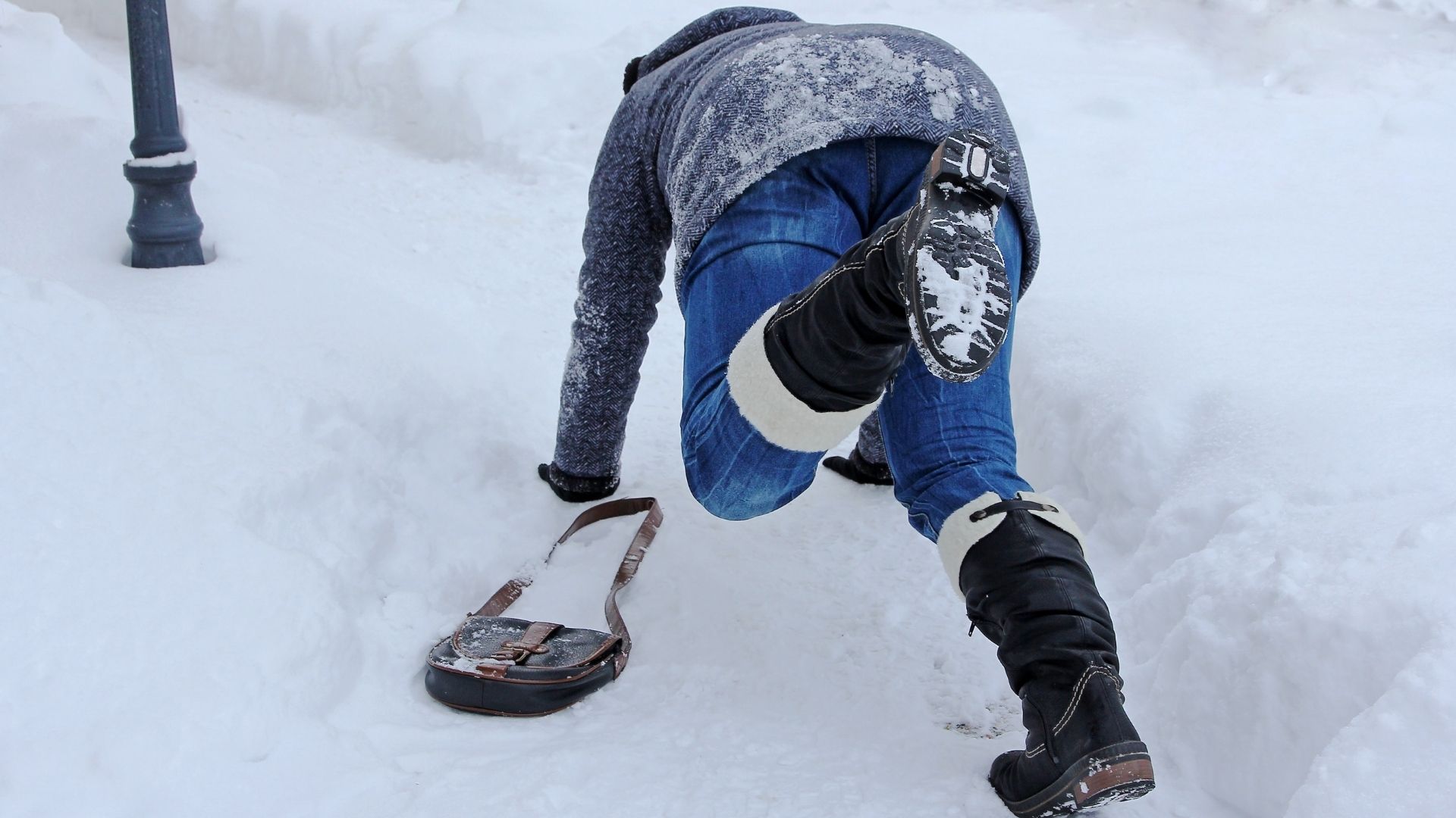 women slipping and falling down in snow foosh injury rehabilitation Propel Physiotherapy