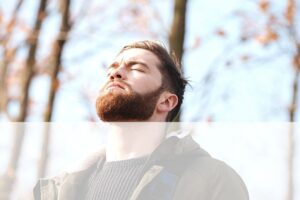 Man doing breathing exercises on a walk. Mindfulness training Propel Physiotherapy. 