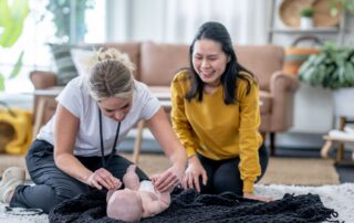Young infant receiving Erb's palsy treatment at Propel Physiotherapy.