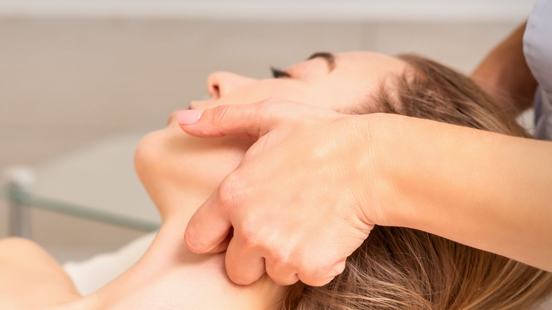 Woman receiving lymphatic drainage massage therapy at Propel Physiotherapy.
