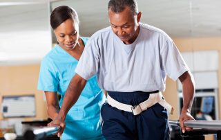 Person with brain injury doing gait training with physiotherapist. Neurological rehabilitation exercises at Propel Physiotherapy.