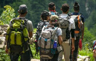 Group of six people out for a hike with backpacks on. Cardio zone training for hikers. Propel Physiotherapy.