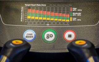 Display monitor on elliptical machine showing target heart rate zones. Cardio zone training for weight management. Propel Physiotherapy.