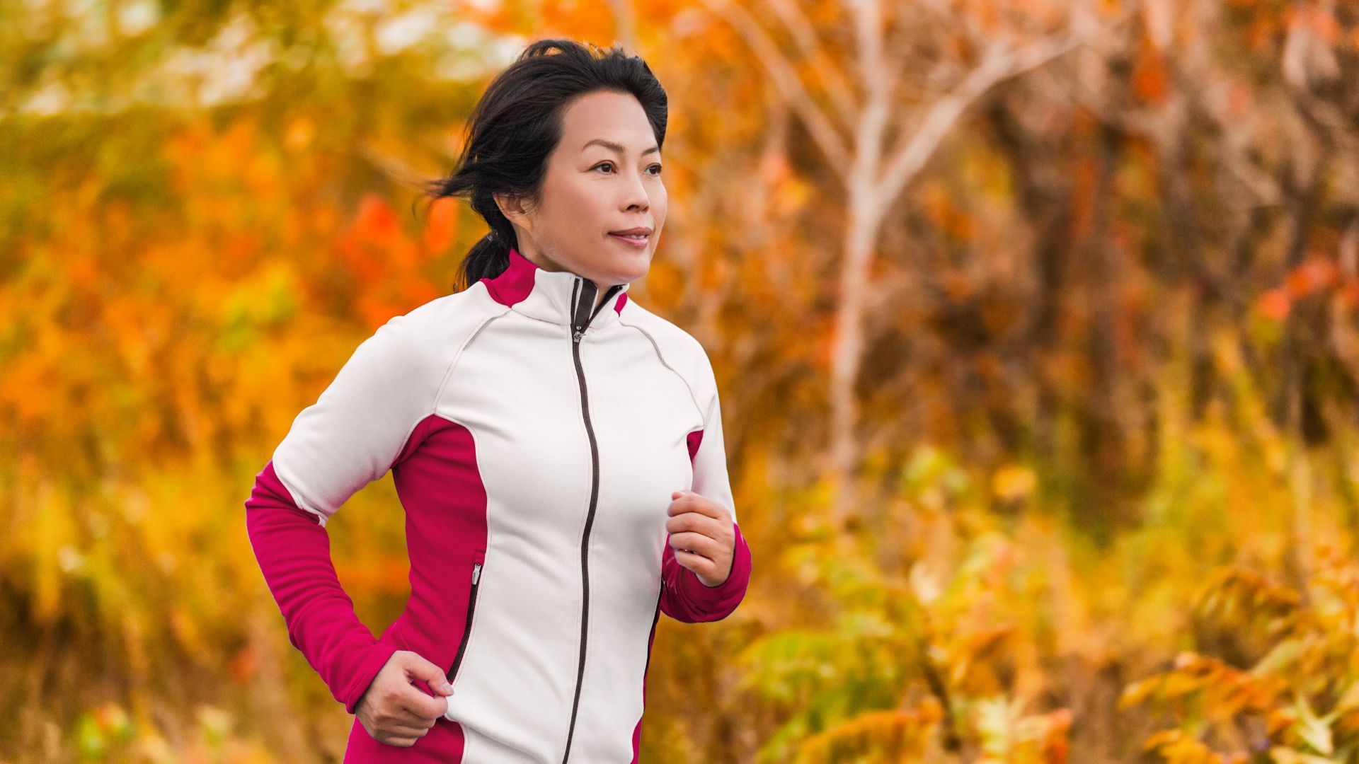 Middle-aged woman going for a run on a nice fall day. Six brain healthy lifestyle strategies for women recommended by physiotherapists at Propel Physiotherapy.